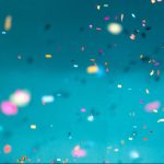 confetti falling in air on plain background