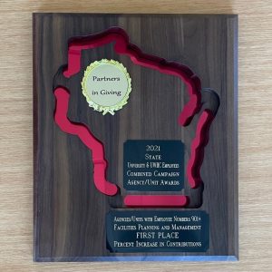 Award plaque with engraving in the shape of the state of Wisconsin