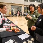 Cindy Torstveit, associate vice chancellor with Facilities Planning & Management, talks with Passion Malotky, recruitment specialist, and Alondra Vazquez Rodriguez, HR generalist with the job rotation program.